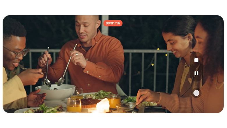 A video of a group of people enjoying dinner outdoors in the evening can be seen. Even in low light, ProVisual Engine helps keep the scene bright and details clear.