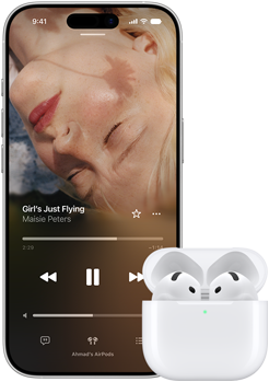 iPhone next to AirPods in charging case, case is open