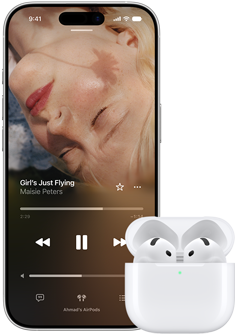 iPhone next to AirPods in charging case, case is open