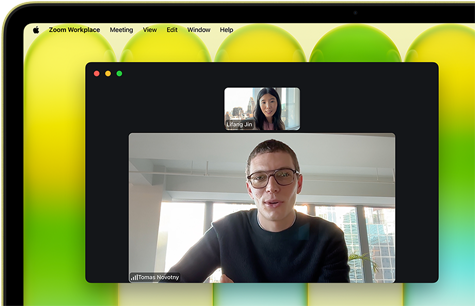 MacBook Neo, citrus color, video call onscreen, Center Stage feature keeps user centered in the frame