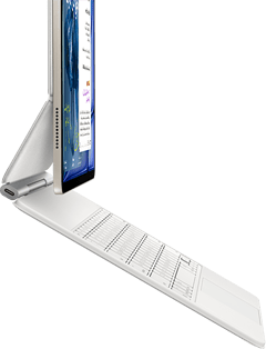 جهاز iPad&nbsp;Air، لون ضوء النجوم، متصل بلوحة مفاتيح ماجيك، لون أبيض، الجهة الجانبية الخارجية