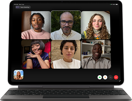 iPad Air, attached to Magic Keyboard, Black color, Group FaceTime call on screen