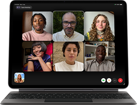 iPad Air, attached to Magic Keyboard, Black color, Group FaceTime call on screen
